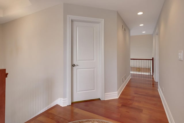 8453 W Bruce Dr, Niles, IL 60714 - hall with wood finished floors, an upstairs landing, and recessed lighting