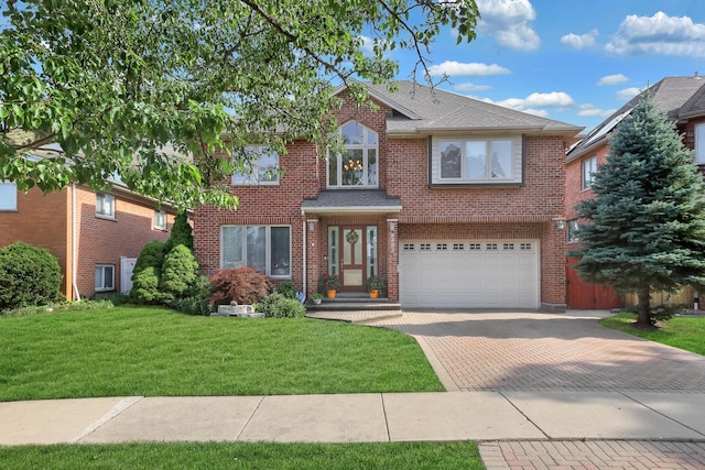 8453 W Bruce Dr, Niles, IL 60714 - traditional-style home with decorative driveway, a front lawn, brick siding, an attached garage, and roof with shingles