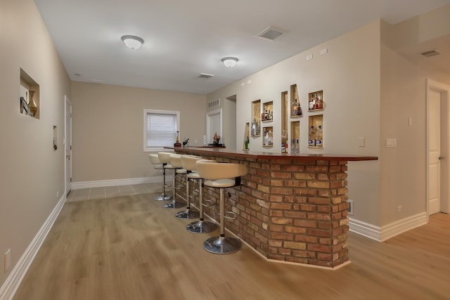 8453 W Bruce Dr, Niles, IL 60714 - indoor bar featuring light wood-style flooring