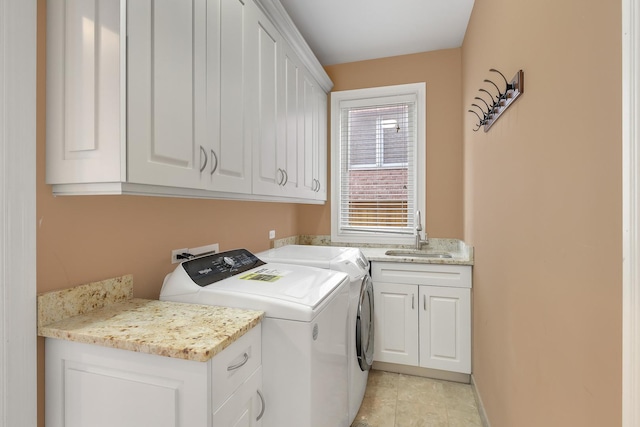 8453 W Bruce Dr, Niles, IL 60714 - laundry area with cabinet space, washer and dryer, and light tile patterned flooring