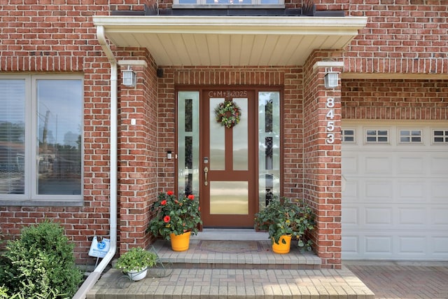 8453 W Bruce Dr, Niles, IL 60714 - property entrance featuring brick siding and an attached garage