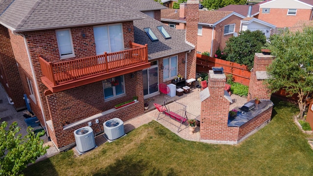 8453 W Bruce Dr, Niles, IL 60714 - rear view of property with brick siding, roof with shingles, a patio, and a fenced backyard