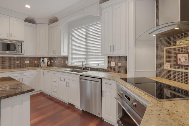 8453 W Bruce Dr, Niles, IL 60714 - kitchen featuring appliances with stainless steel finishes, wall chimney exhaust hood, white cabinetry, and recessed lighting