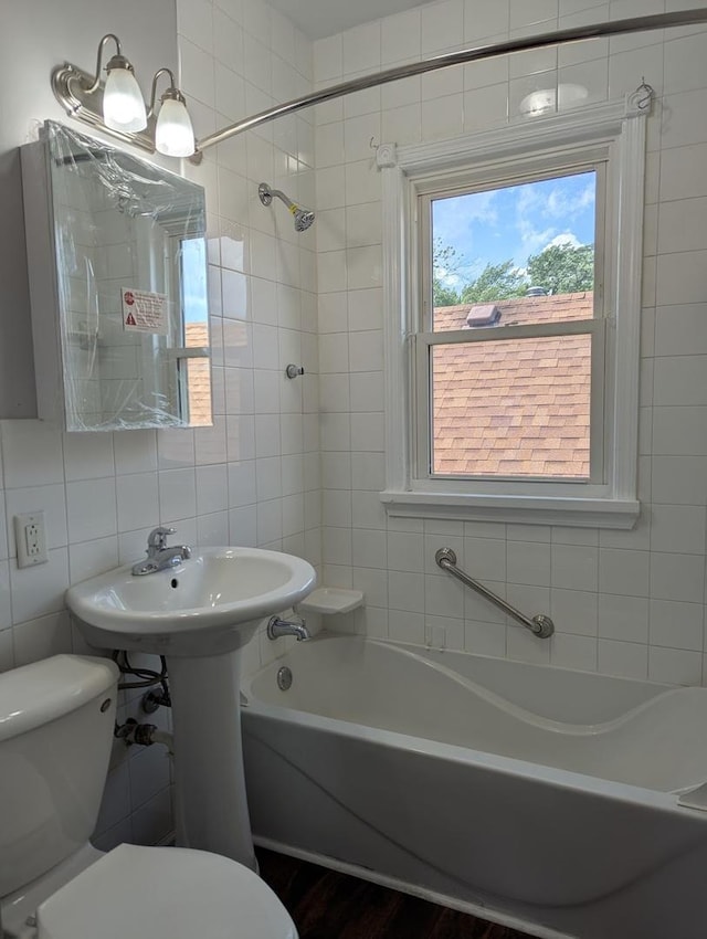 8817 S Elizabeth St, Chicago, IL 60620 - full bath with tile walls, decorative backsplash, and bathtub / shower combination