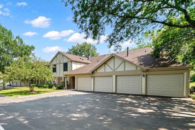 543 Williamsburg Ct Unit C2, Wheeling, IL 60090 - english style home with asphalt driveway and a garage