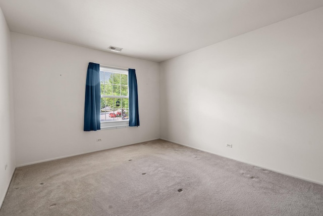 543 Williamsburg Ct Unit C2, Wheeling, IL 60090 - carpeted empty room with baseboards