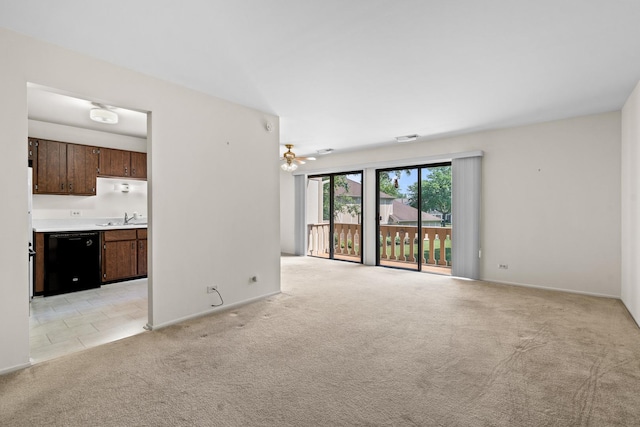 543 Williamsburg Ct Unit C2, Wheeling, IL 60090 - unfurnished living room with light colored carpet and a ceiling fan