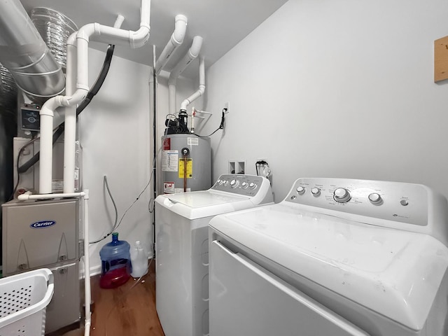 251 Maryland Ln, Pingree Grove, IL 60140 - laundry area featuring washer and clothes dryer, electric water heater, wood finished floors, and heating unit