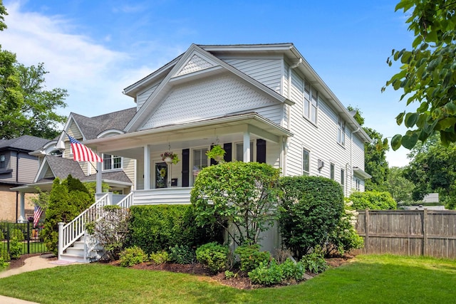 1718 Lake Ave, Wilmette, IL 60091 - view of front of property with stairway and a porch