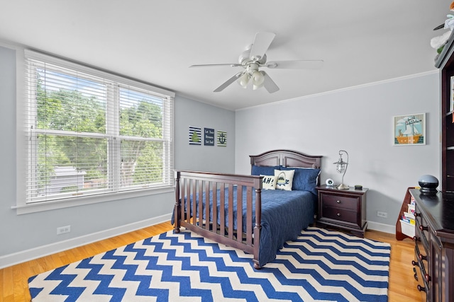 1718 Lake Ave, Wilmette, IL 60091 - bedroom with wood finished floors, crown molding, and a ceiling fan