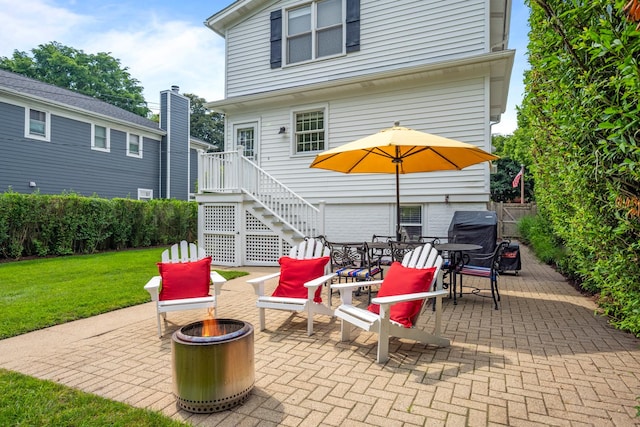 1718 Lake Ave, Wilmette, IL 60091 - view of patio with a fire pit, a grill, and stairway