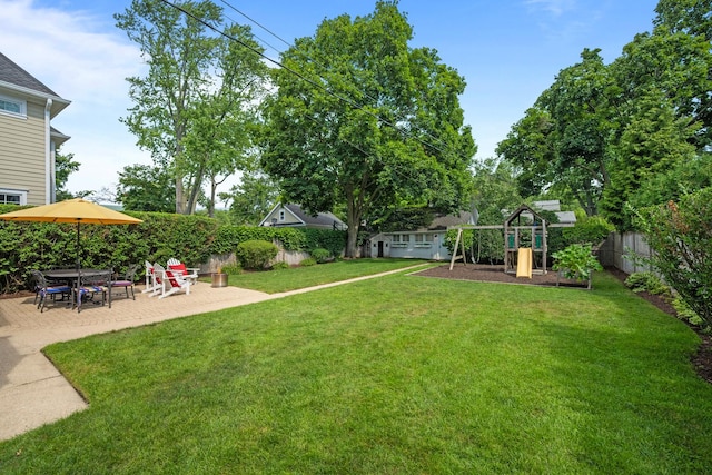 1718 Lake Ave, Wilmette, IL 60091 - fenced backyard with a playground and a patio area