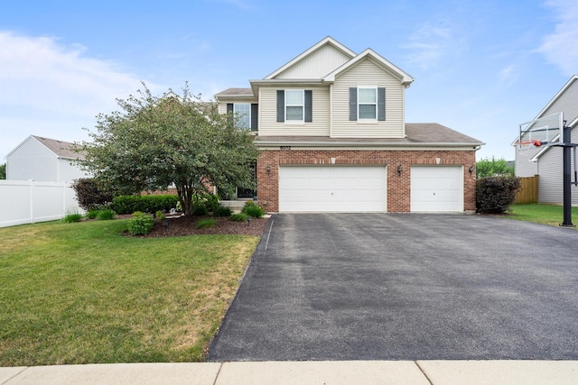 8102 Expedition St, Joliet, IL 60431 - view of front of home featuring a garage, asphalt driveway, and brick siding