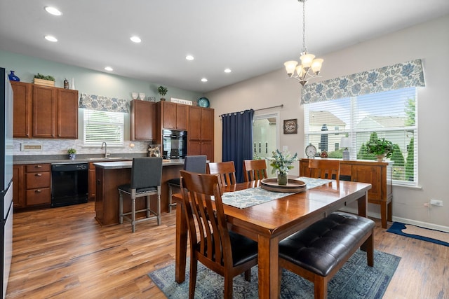 8102 Expedition St, Joliet, IL 60431 - dining area featuring light wood-style floors, recessed lighting, and a chandelier