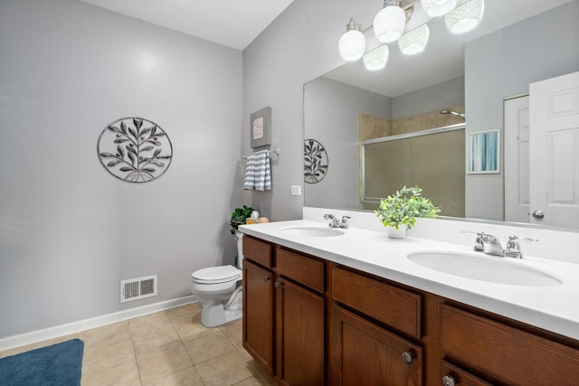 8102 Expedition St, Joliet, IL 60431 - bathroom with a shower stall, double vanity, and tile patterned flooring