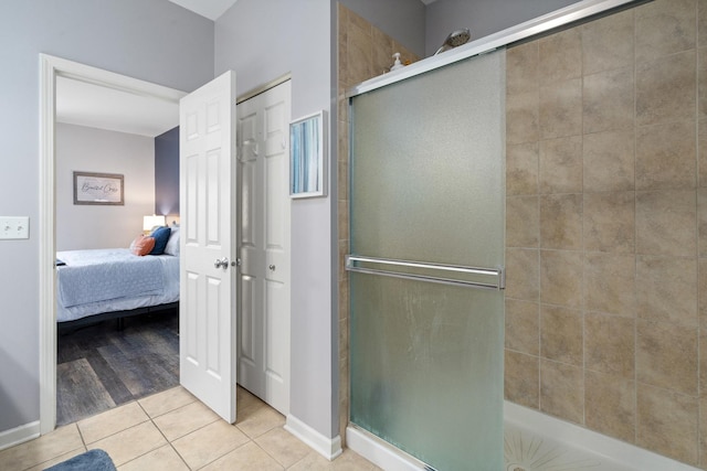8102 Expedition St, Joliet, IL 60431 - ensuite bathroom featuring tile patterned flooring and a shower stall