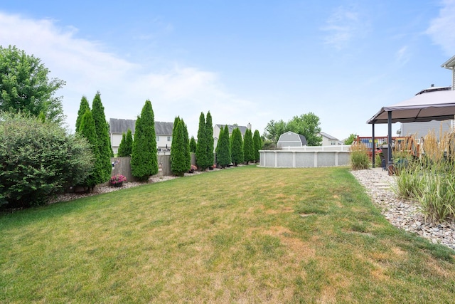8102 Expedition St, Joliet, IL 60431 - fenced yard featuring a gazebo and an outdoor pool