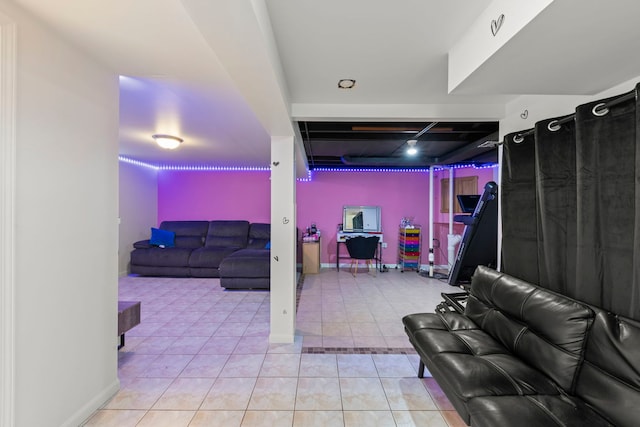 3812 N Pioneer Ave, Chicago, IL 60634 - living room featuring light tile patterned flooring and baseboards