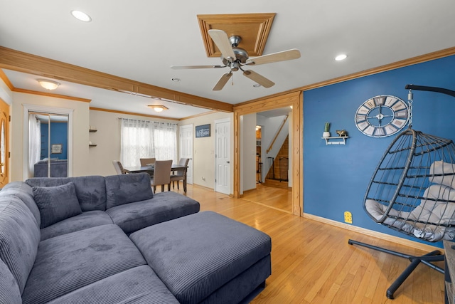 3812 N Pioneer Ave, Chicago, IL 60634 - living room featuring ornamental molding, a ceiling fan, stairs, light wood finished floors, and recessed lighting