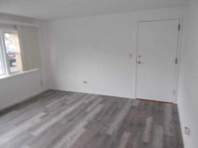 10811 S Lloyd Dr Unit 2, Worth, IL 60482 - empty room with wood finished floors