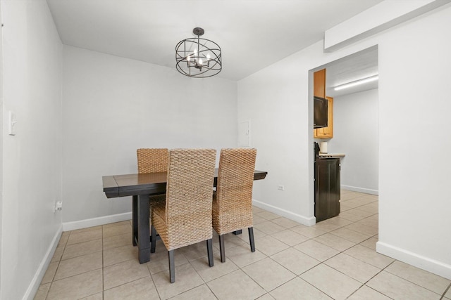 2021 S Wolf Rd Unit 2-118, Hillside, IL 60162 - dining area with light tile patterned floors and a chandelier