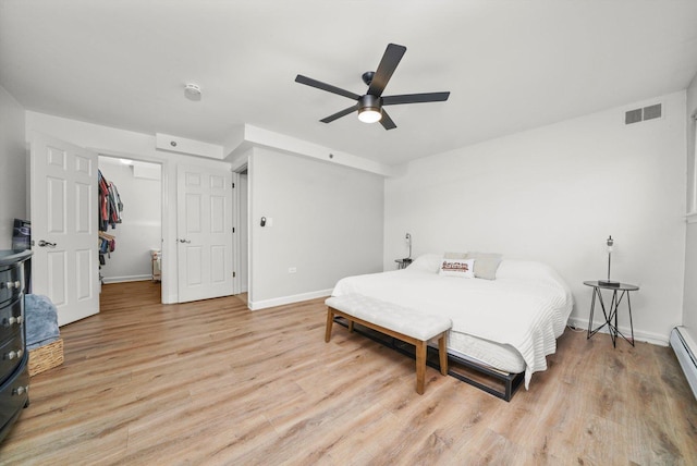 2021 S Wolf Rd Unit 2-118, Hillside, IL 60162 - bedroom featuring light wood-style flooring and ceiling fan