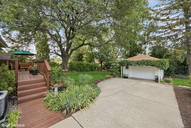 1865 Sunnyside Ave, Westchester, IL 60154 - view of green lawn with a garage, a wooden deck, driveway, and an outbuilding