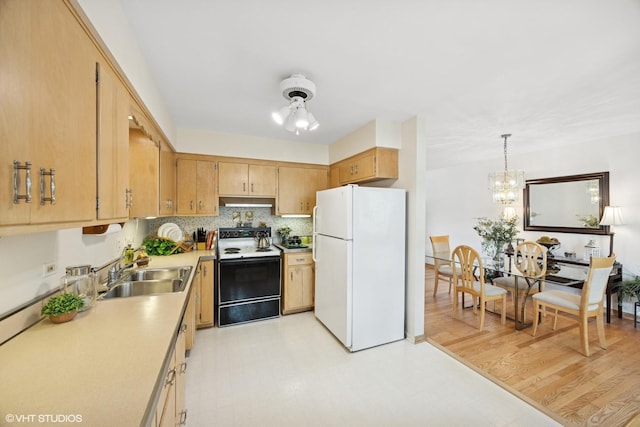 1865 Sunnyside Ave, Westchester, IL 60154 - kitchen featuring white appliances, light flooring, light countertops, under cabinet range hood, and tasteful backsplash