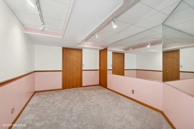 6919 Lexington Ct, Tinley Park, IL 60477 - carpeted empty room with rail lighting