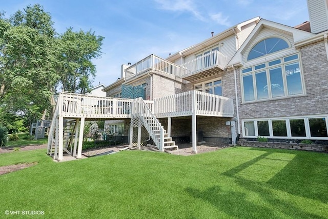 6919 Lexington Ct, Tinley Park, IL 60477 - rear view of house with stairway, a lawn, and brick siding