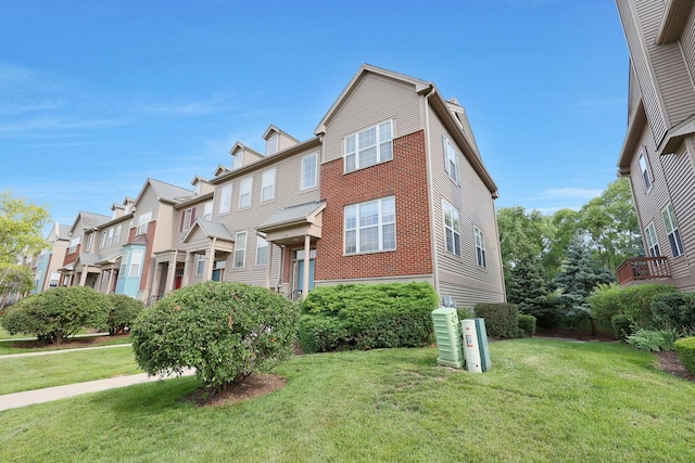 64 Village Station Ln, Grayslake, IL 60030 - view of front facade featuring a front yard and a residential view