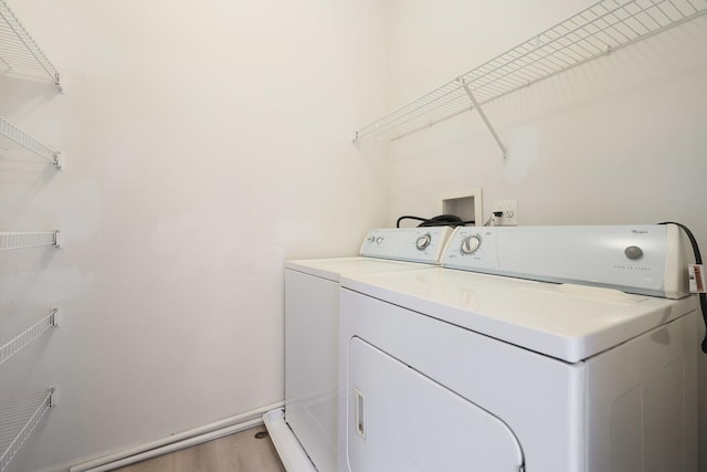 64 Village Station Ln, Grayslake, IL 60030 - laundry room with separate washer and dryer and light wood-style floors