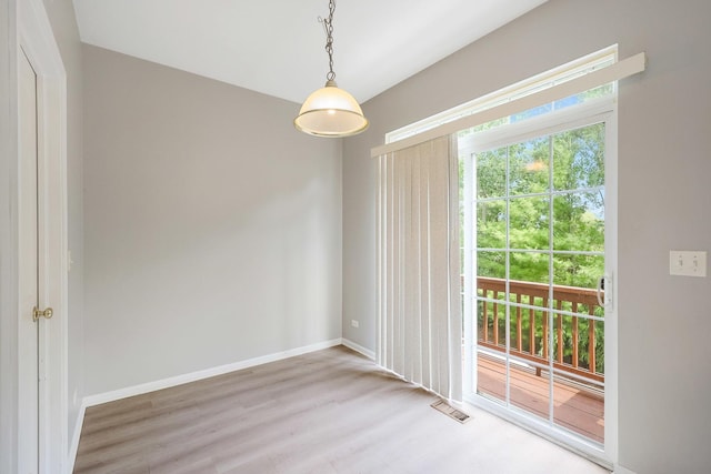 64 Village Station Ln, Grayslake, IL 60030 - spare room with plenty of natural light and wood finished floors