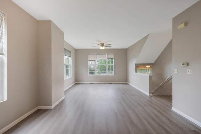 64 Village Station Ln, Grayslake, IL 60030 - unfurnished living room with wood finished floors and a ceiling fan