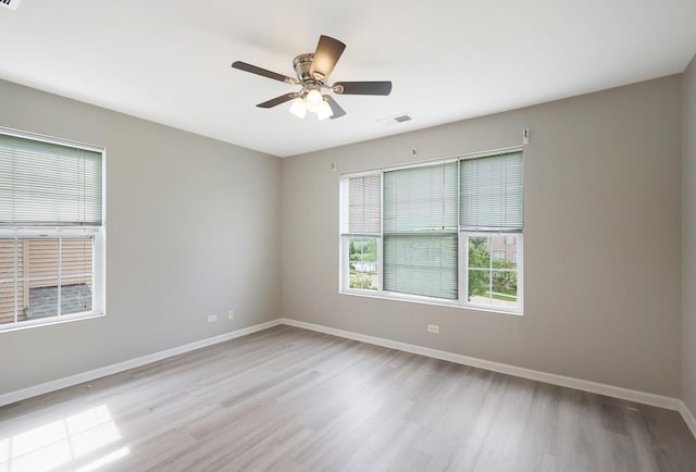 64 Village Station Ln, Grayslake, IL 60030 - empty room featuring wood finished floors and a ceiling fan