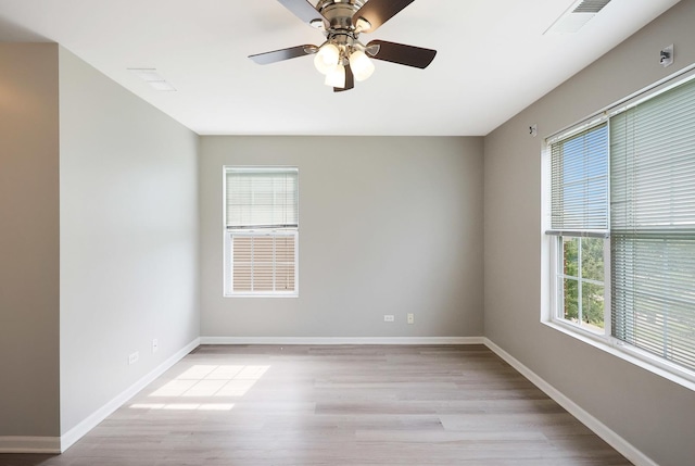 64 Village Station Ln, Grayslake, IL 60030 - unfurnished room featuring light wood-type flooring and a ceiling fan