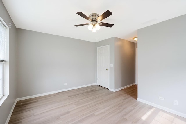 64 Village Station Ln, Grayslake, IL 60030 - unfurnished room featuring light wood-style flooring and ceiling fan