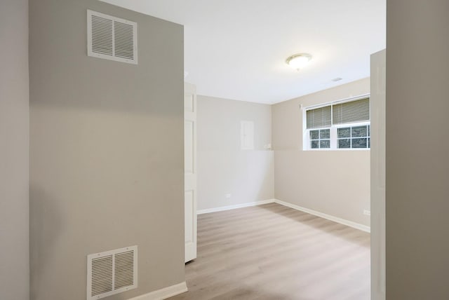 64 Village Station Ln, Grayslake, IL 60030 - unfurnished room featuring wood finished floors and baseboards