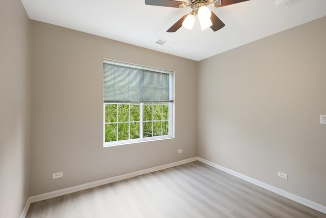 64 Village Station Ln, Grayslake, IL 60030 - empty room with wood finished floors and ceiling fan
