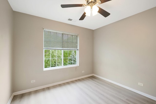 64 Village Station Ln, Grayslake, IL 60030 - unfurnished room with light wood-style flooring and a ceiling fan