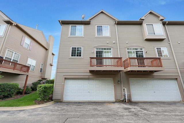 64 Village Station Ln, Grayslake, IL 60030 - back of property with driveway and a garage