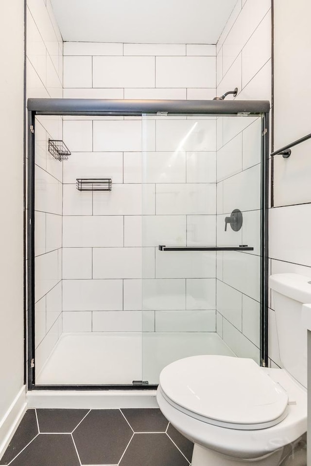 2244 S Sawyer Ave, Chicago, IL 60623 - full bathroom featuring a shower stall and tile patterned floors