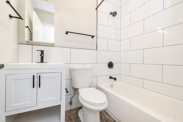 2244 S Sawyer Ave, Chicago, IL 60623 - full bathroom featuring wood finished floors, vanity, and shower / bathtub combination