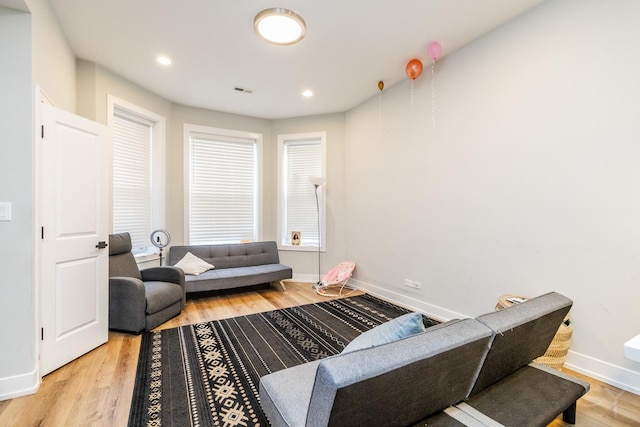 2244 S Sawyer Ave, Chicago, IL 60623 - living room with wood finished floors and recessed lighting