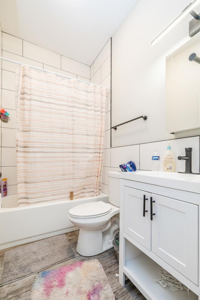 2244 S Sawyer Ave, Chicago, IL 60623 - full bath featuring vanity, shower / bathtub combination with curtain, and wood finished floors