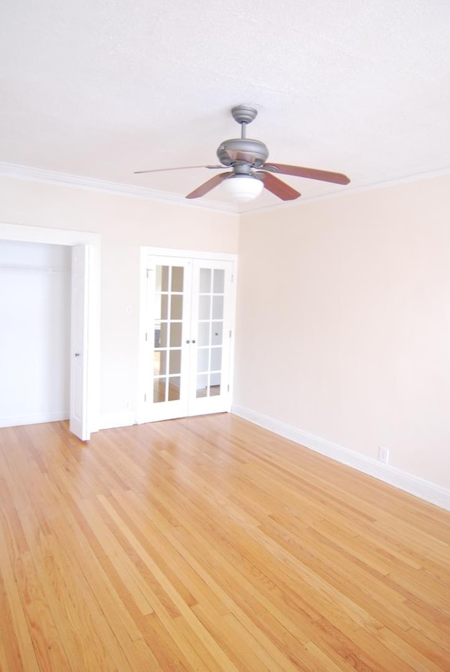 6207 N Winthrop Ave Unit 30, Chicago, IL 60660 - empty room featuring french doors, a ceiling fan, crown molding, and light wood-style flooring
