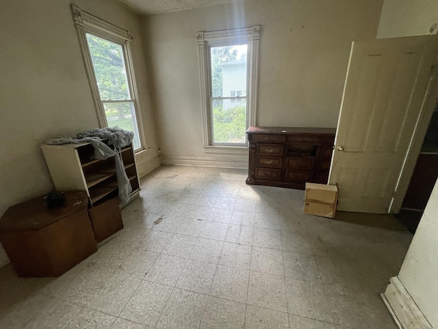 1644 E William St, Decatur, IL 62521 - bedroom with light floors and baseboards