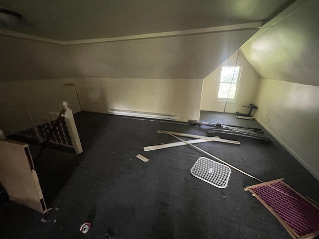 1644 E William St, Decatur, IL 62521 - additional living space featuring vaulted ceiling, baseboard heating, and rubber floors