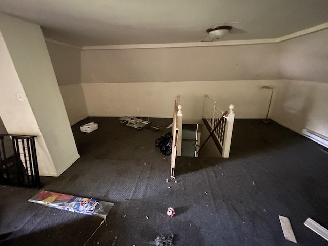 1644 E William St, Decatur, IL 62521 - carpeted empty room featuring a baseboard heating unit