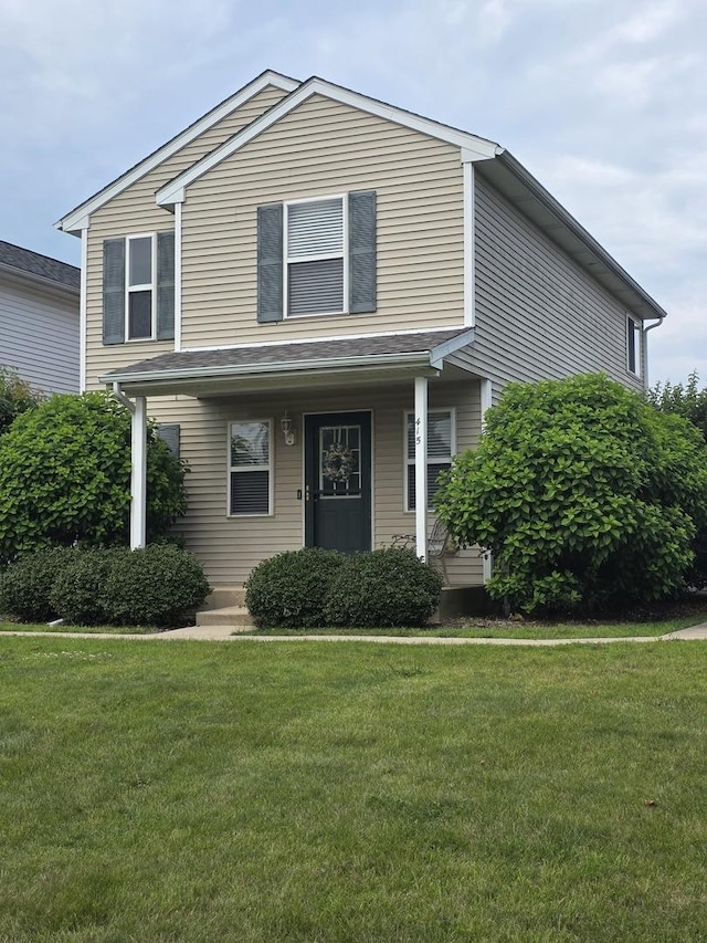 415 Andrea Ct, Harvard, IL 60033 - traditional-style home with a front yard and a porch